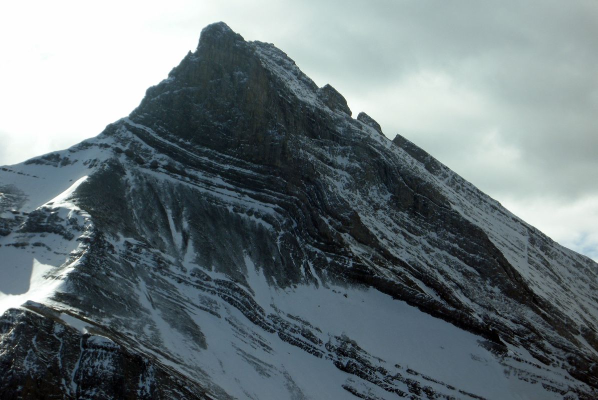 09 The Three Sisters Faith Peak Close Up From Helicopter Just After Takeoff From Canmore To Mount Assiniboine In Winter